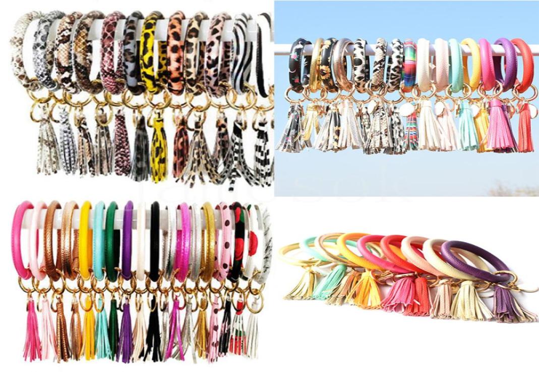 

Multiple Styles Pattern Leather Wrap Tassels Bracelets Keychain Wristlet Bracelet Tassel Keychain Round Bangle Key Ring DB1869163061