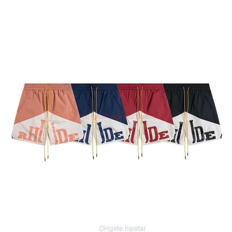 

Designer Short Fashion Casual Clothing Beach shorts Rhude Contrasting Color Patchwork Printed Elastic Drawstring Basketball Casual Mesh Lining Five Point Shorts, Pink
