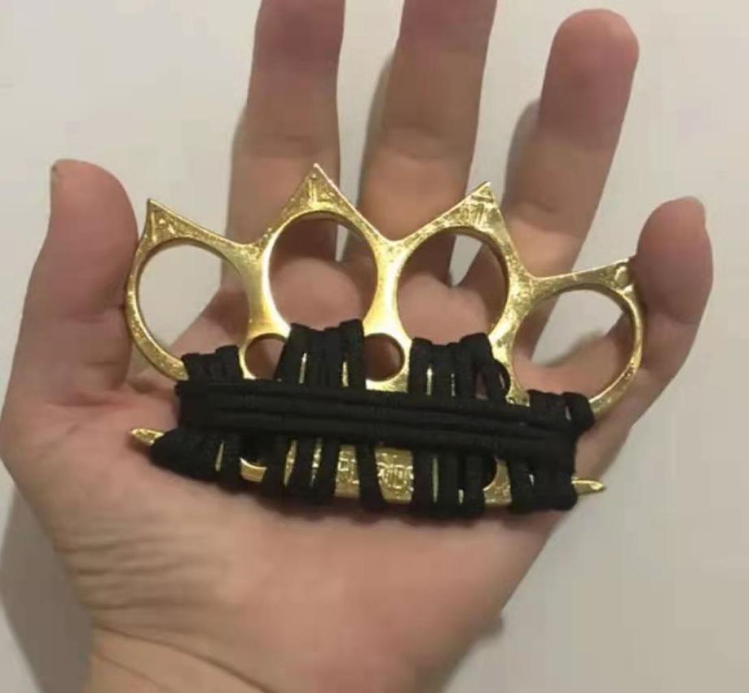 

Glass fiber finger tiger four finger selfdefense weapons will hand in hand buckle tiger finger fist button selfdefense fighting 7533355
