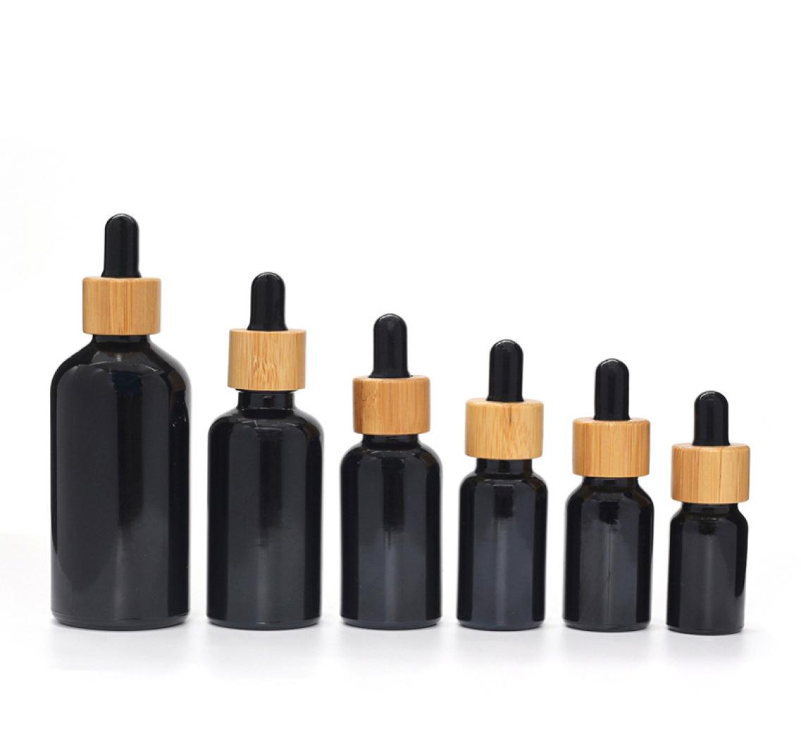 

UVproof Lightproof Natural Black Glass Material Beard oil Dropper Bottle with Bamboo Lid 5ml 10ML 15ML 20ml 30ML 50ML 100ML Es3099355