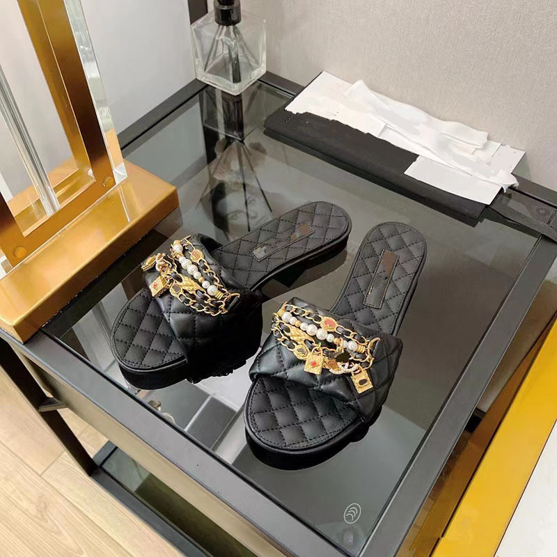 

Women's Slippers 2023 Summer New Chain One Line Outwear Baita Beach Sandals Flat Bottom Metal Decoration Fashion Women's Shoes, Black