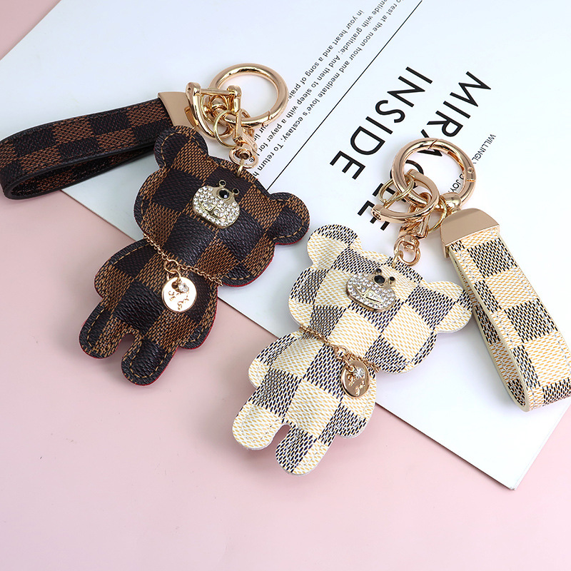 

Car keychain inlaid with diamond accessories trendy and fashionable rabbit modern simple key hanging accessories wholesale Little BearKey Rings