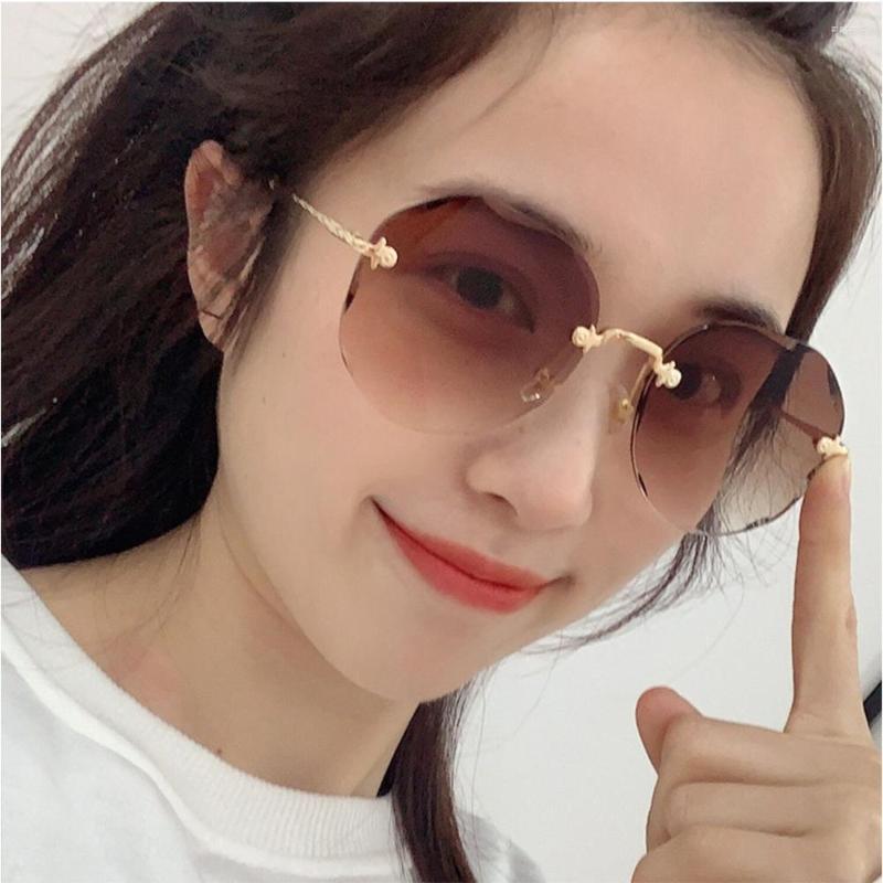 

Sunglasses WENLCCK Frameless Trimmed Round South Korean Women's Face Plain