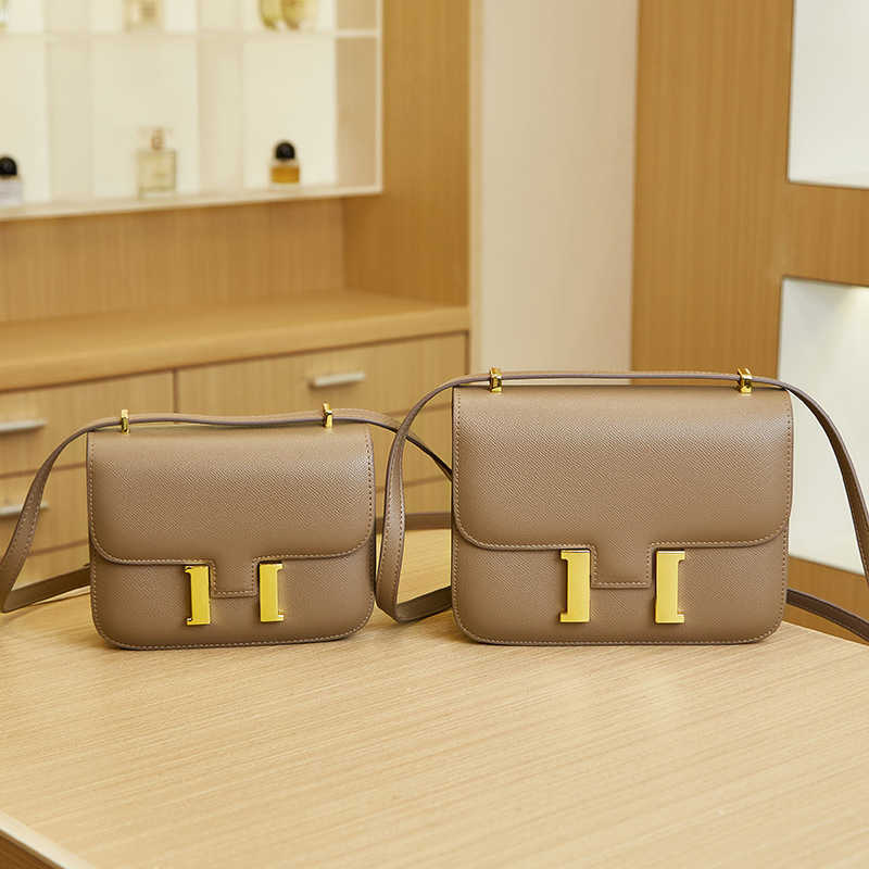 

Designer H Home bag Flight Attendant Bag Female 2023 New Summer Luxury Button Kangkang Single Shoulder Crossbody Box Tofu, Large size