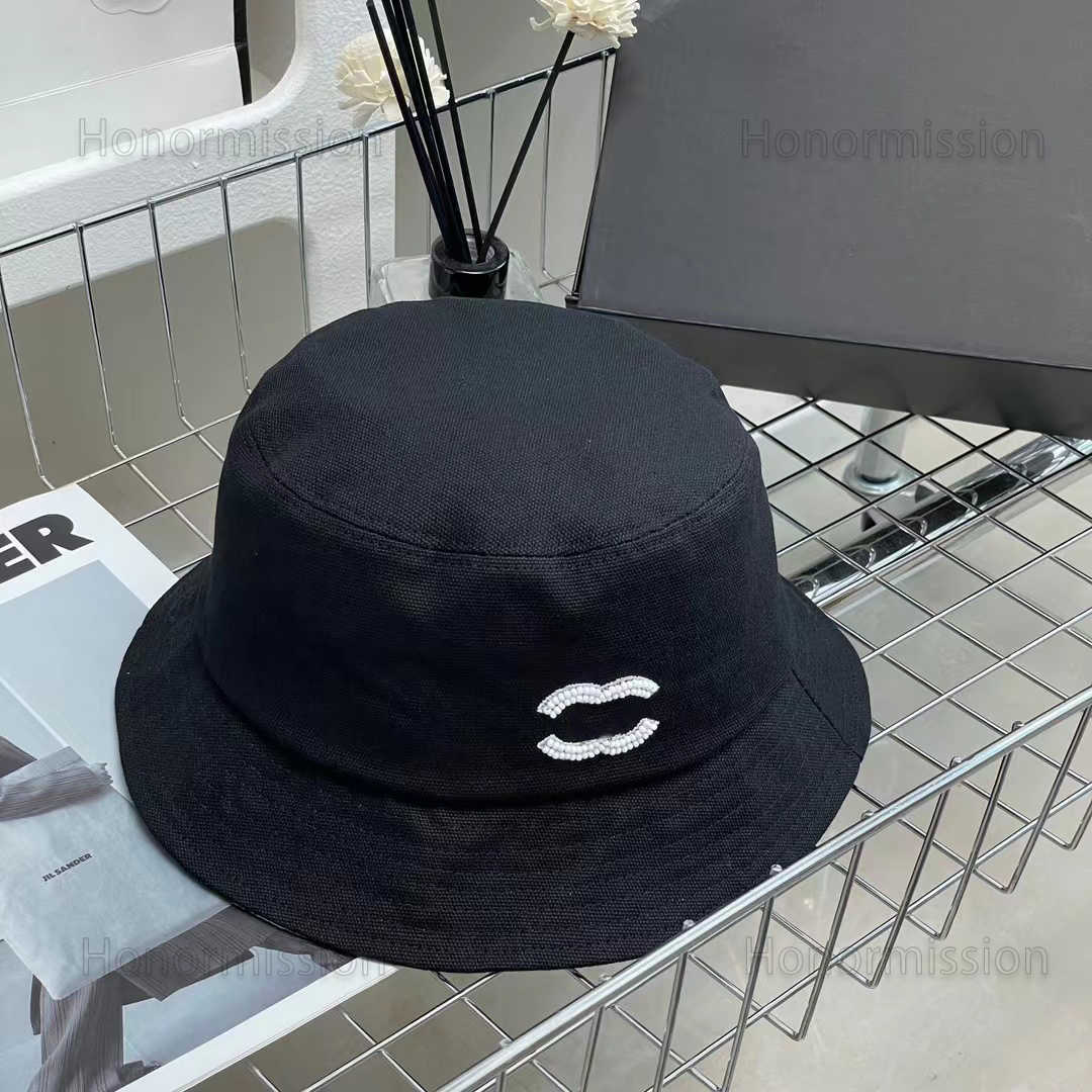 

Designer Luxury channel Classic Bucket Cap Fashion Beach Hat Versatile Mens And Womens Leisure Breathable Hat 215206