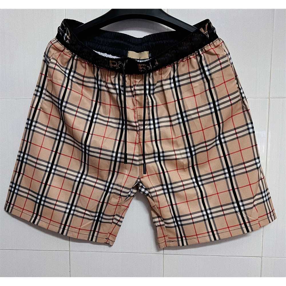 

Men's designer summer beach shorts fashion plaid print striped drawstring pants loose men's casual street Asian size M-3XL 2ANP