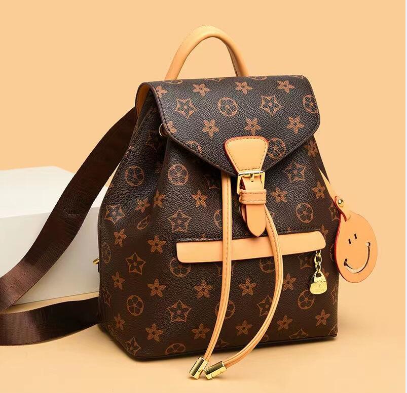 

Large Capacity Designer Duffel Backpack Luxury Travel Bag for Men and Women schoolbag 2023 Edition montsouris bb, Brown oid flower orange ribbon