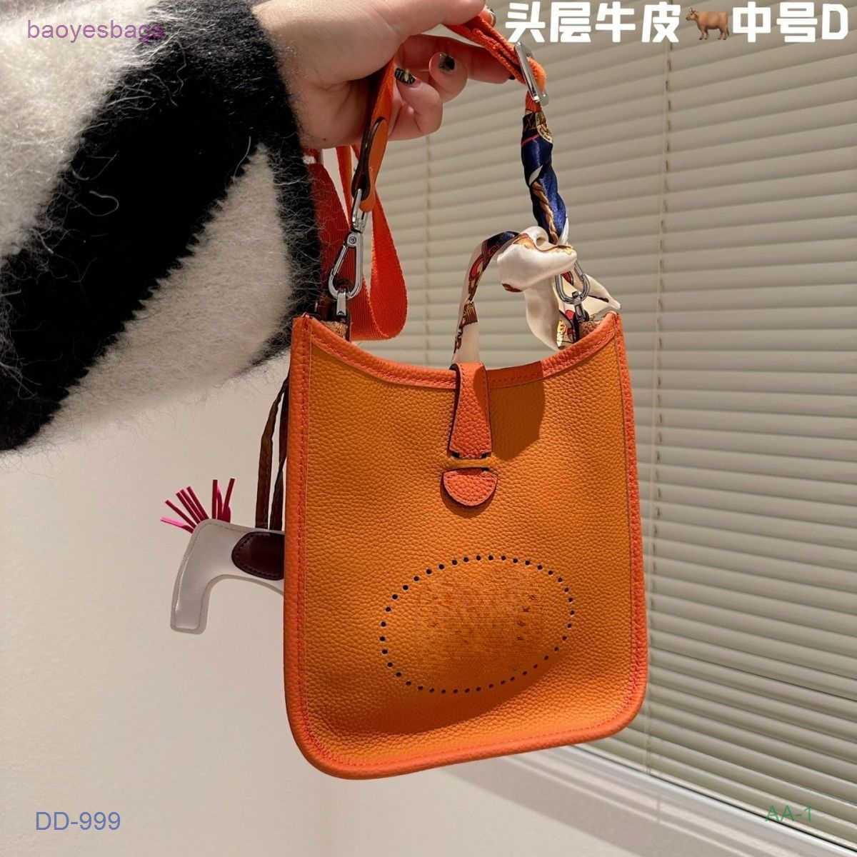 

Designer Bag Bags Layer Evelynbag Women's Totes Bucket 2023 Cow High End Top with Lychee Pattern h Hollow Out Single Shoulder Cross De3f With Logo CEKJ