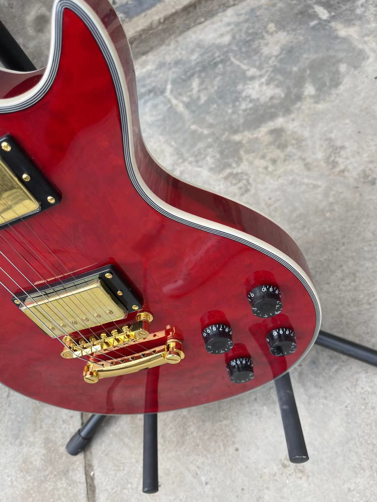 

Red LP guitar China Type Electric Guitar Fast Free Ship