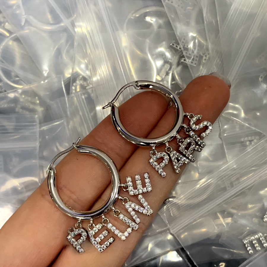 

New designed TRIOMPHE Arch Crystal tassel EARRINGS IN BRASS WITH GOLD SHINY WOMEN EAR HOOPS Designer Jewelry CE LINE9003