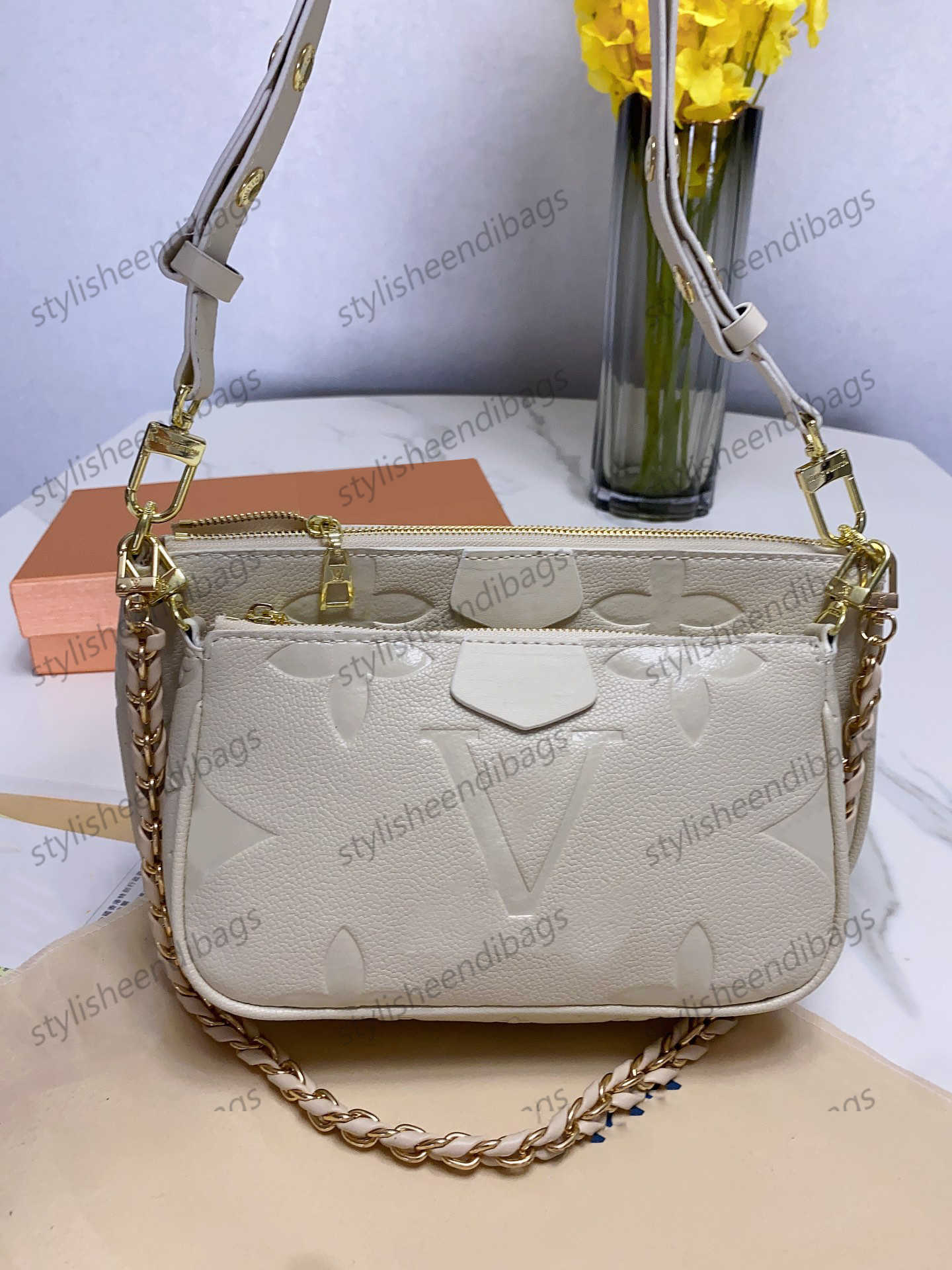 

Luxurys Designers bag Women's Fashion Embossing flower pochette Handbag composite bags Genuine Leather Elegant Womens Shoulder Crossbody Bag stylisheendibags