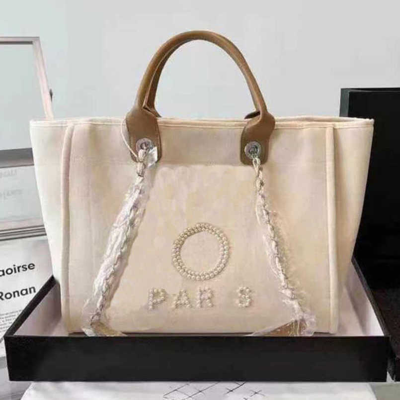 

Women's Luxury Beach Bag Brand Hand Bags Ch Embroidered Handbag Female Pearl Big Shopping Small Backpacks Designers Canvas Chain Backpack Evening Handbags Hmo3