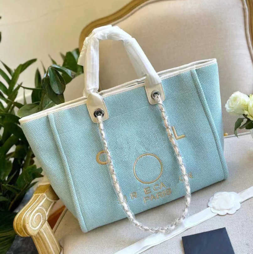 

Luxury Beach Women's Bag Brand Hand Bags Embroidered Handbag Female Pearl Big Shopping Small Backpacks Designers Canvas Chain Backpack Evening Handbags Mw50