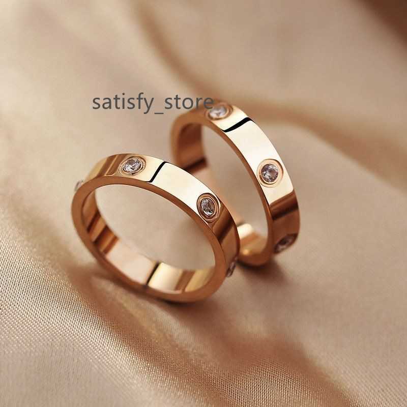 

Simple stones and generous titanium steel card home ring female fashion niche design exquisite decorative ring pair ring net red tide jewelry
