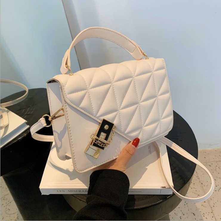 

Solid color small bag 2022 autumn new fashion messenger bag foreign style Lingge simple portable women's bag, White5