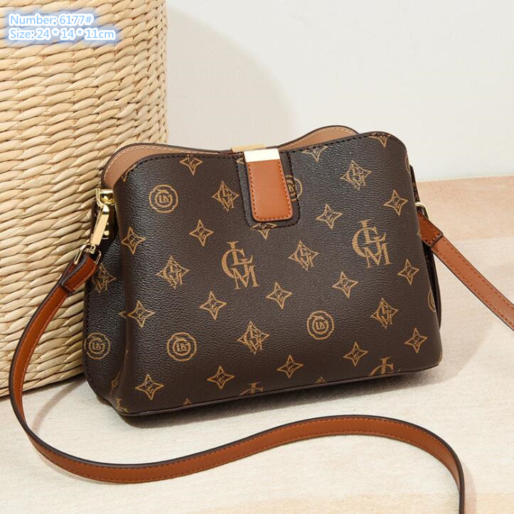 Factory wholesale ladies shoulder bags 3 colors elegant atmosphere printed handbag three-layer interlayer leather bucket bag trend color matching-image-773479034