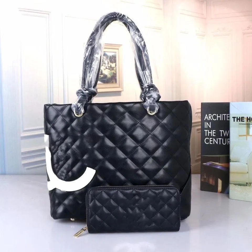 

designer Two piece case mother genuine leather bag classic embossed figure handbag gift wallet soft and delicate essential for travel