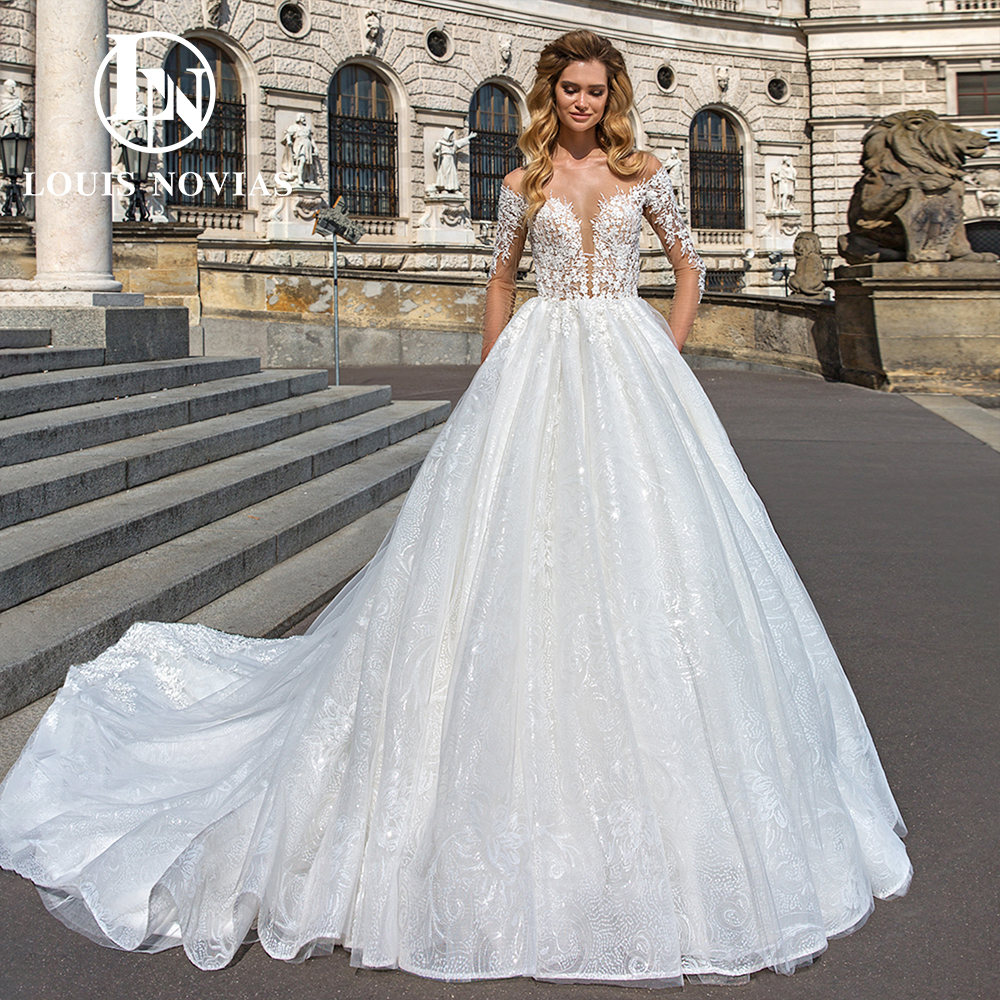 

Ball Gown Long Sleeves Wedding Dress 2023 Sweetheart Sparkling Tulle Appliques Sequins Semi-Transparent Dress for Bride Vestidos De Novia, Champagne