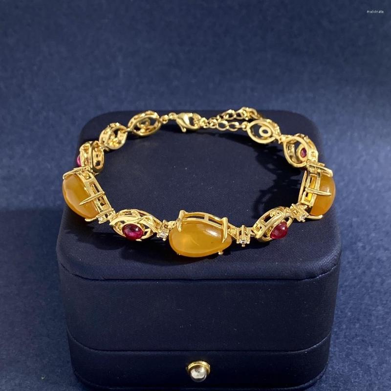 

Link Bracelets IN Vintage Classical Hollow Eye Shape Red Corundum 3 Drops Of Chicken Oil Yellow Chalcedony Main Stone Bracelet