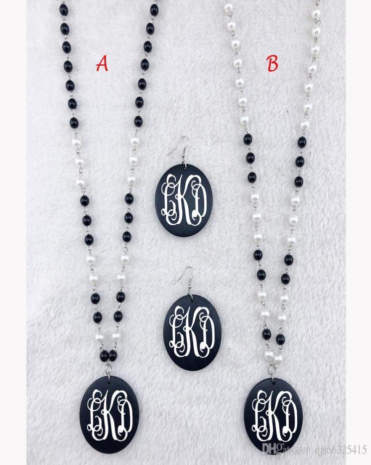 

Monogram Acrylic round pendant black and white pearl NecklacePersonalized monogram customized Vinyl Pearl Linked Black Wooden Disc2944024