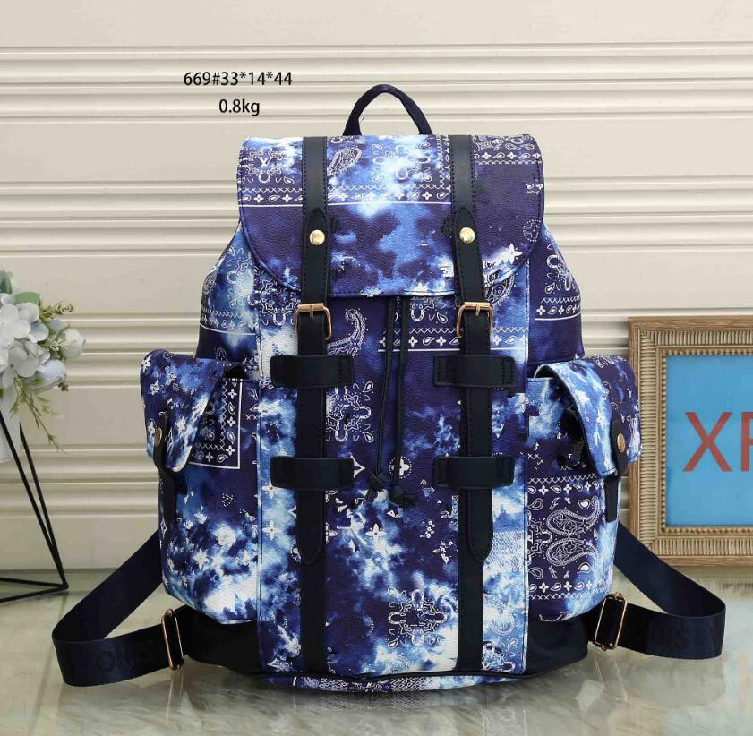 

Designer Bags Unisex Backpack Letter Graffiti Blue Backpack Large Capacity Outdoor Schoolbag Couples Totes Lager Capacity Shoulder Bags Women Men Travel Bags L669