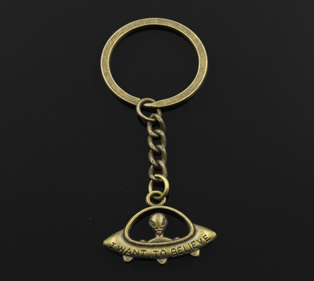 

Fashion 3cm Key Ring Metal Key Chain Keychain Jewelry Antique Bronze Silver Color i Want to Believe Ufo Alien 23x30mm Pendant4091687