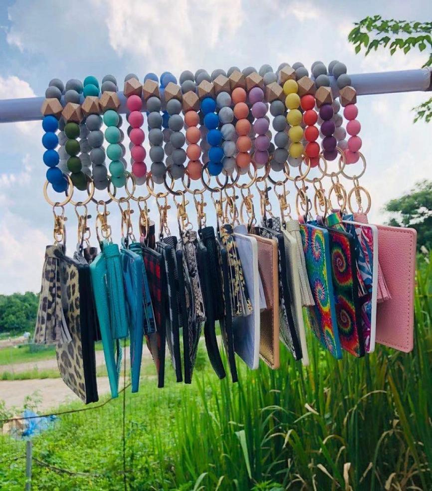 

PU Leather Bracelet Wallet Keychain Party Favor Tassels Bangle Key Ring Holder Card Bag Silicone Beaded Wristlet Keychains Handbag3238058