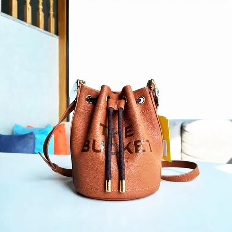 

Women Fashion Bucket Bag Leather Shoulder Bags Womens Designer Handbags Letters String Purse Designers Cross Body Purses D2306202F, White