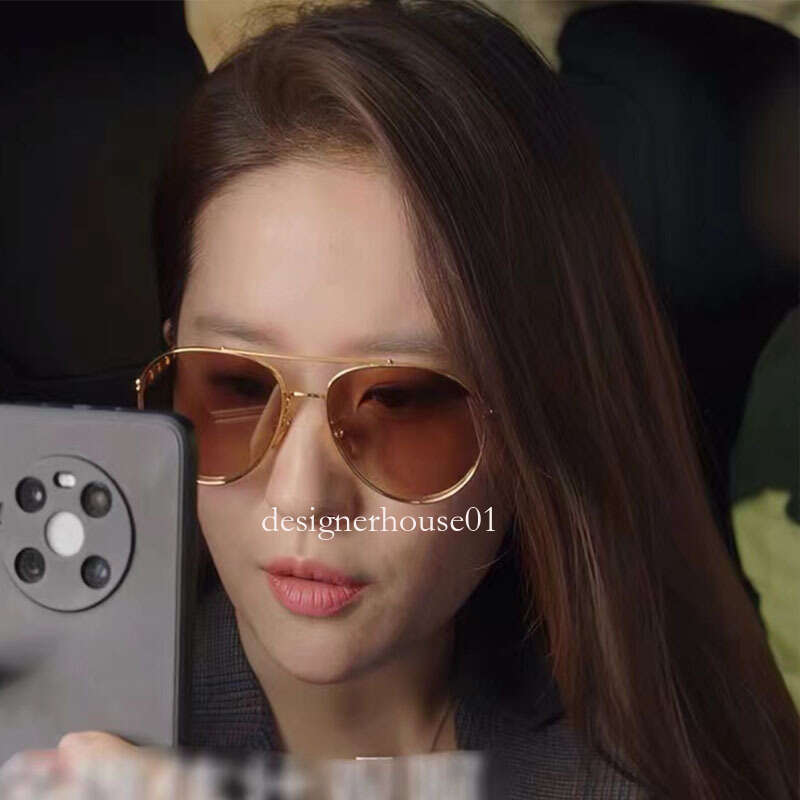 

designer sunglassesLiu Yifei's Sunglasses of the Same Style, Women's Metal Chain, Tan Myopia, Sunglasses, May Be Made by Hongdou in Windy Places