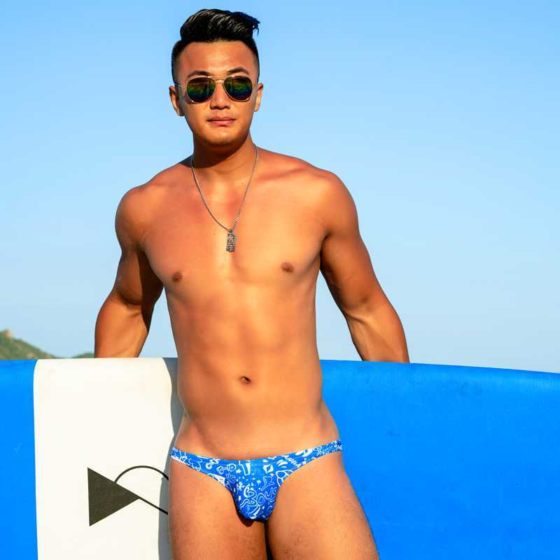 

Men's Swimwear WD313 sexy pouch men swimwear blue print hot low waist tight half hip swimsuits gay men thong bikinis swim briefsHKD230621