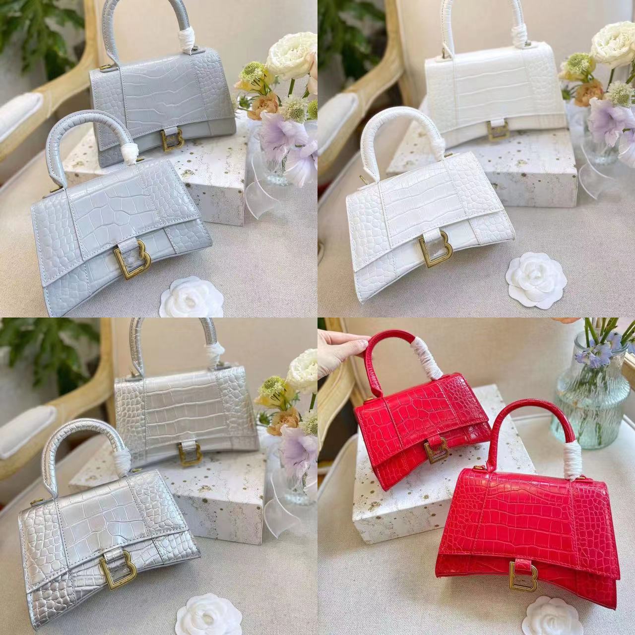 

2023 new bag women's summer hot hand-held one-shoulder hourglass bag cute small bag high-end bag star style