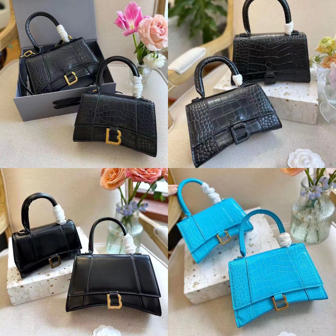 

New bag plain metallic women's summer hot hand-held one-shoulder hourglass bag cute small bag high-end bag star style