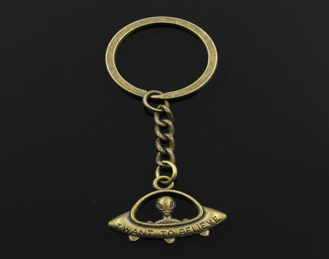 

Fashion 3cm Key Ring Metal Key Chain Keychain Jewelry Antique Bronze Silver Color i Want to Believe Ufo Alien 23x30mm Pendant1211105