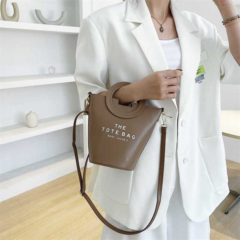 

Designer bag 2023 handbag Women's Bucket New Letter Handbag Simple Texture One Shoulder Crossbody, Blue