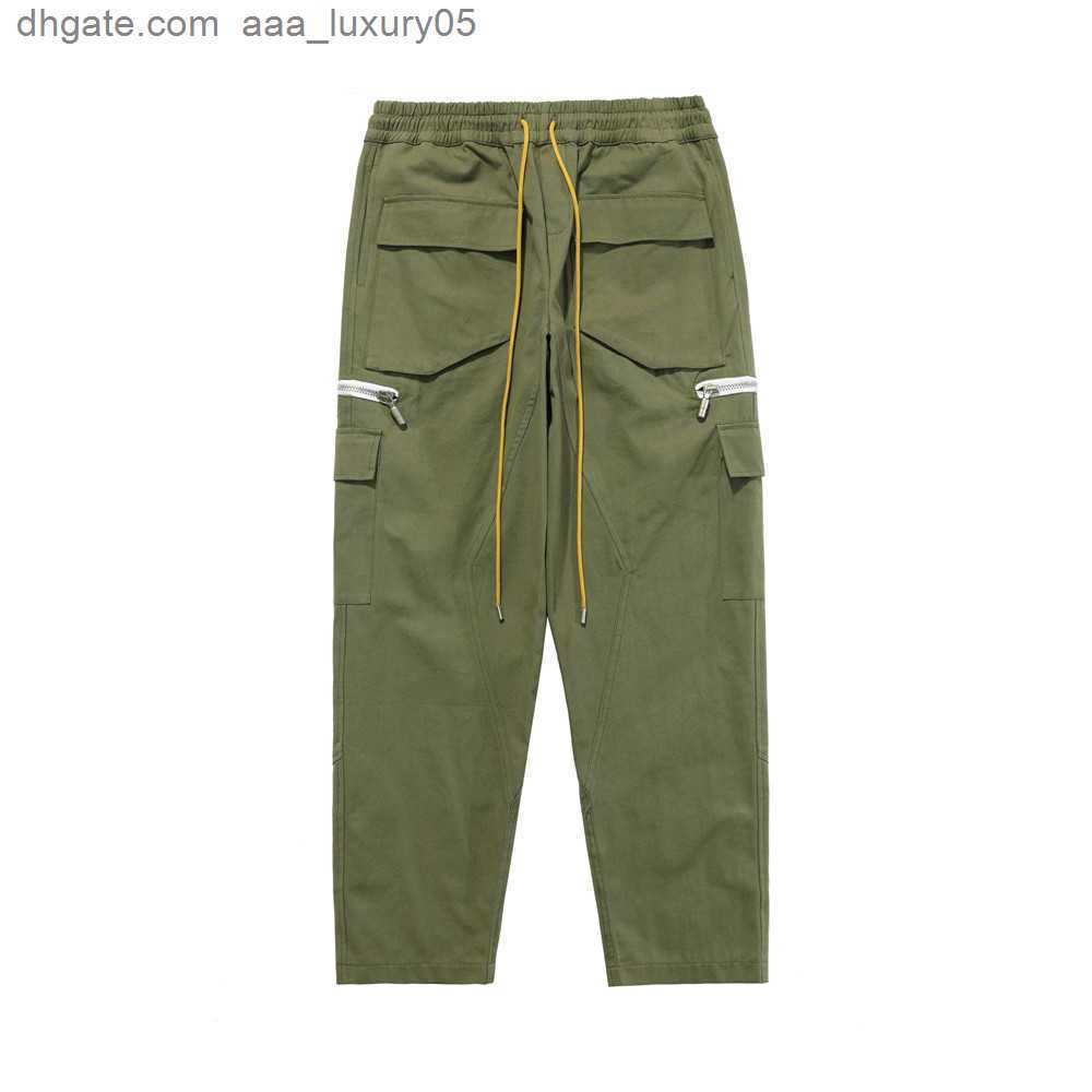 

Designer Clothing Casual Pant 2023 Fashion Brand Rhude High Street Multi Pocket Zipper Breasted Drawstring Ins Casual Pants Streetwear Jogger Trousers Sweatpants, Army green