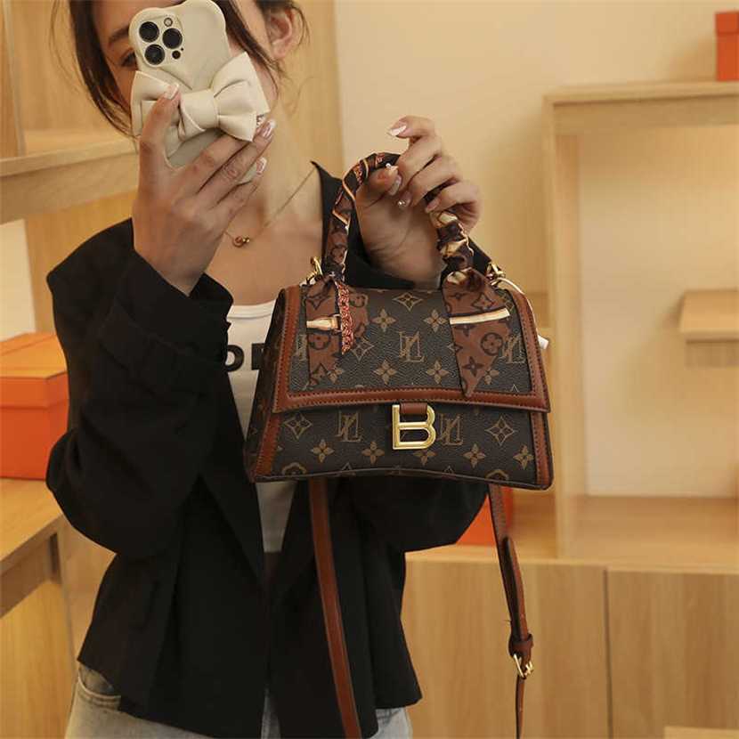 

Designer bag 2023 handbag Hourglass Women's New Print Crossbody Light Luxury High Quality Handheld Shoulder, Brown9