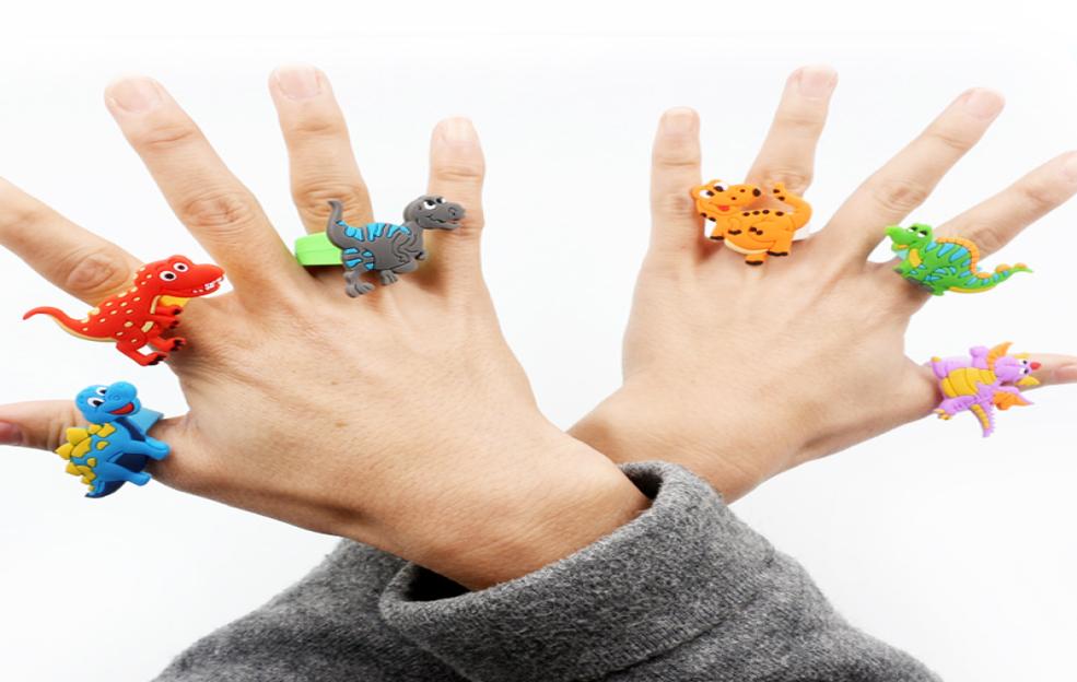 

Whole Cute Cartoon Rings For Children Soft Silicone Dinosaur Ring Kids Toys Gift8234653