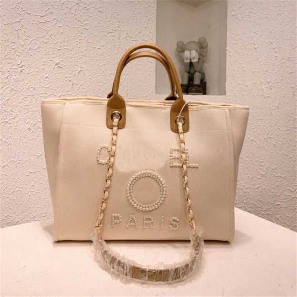 

Beach Women's Luxury Bag Hand Embroidered Pearl Big Ladies Small Backpacks Designers Canvas Chain Backpack Evening Handbags YEBH 70% Off Outlet Online, Sky blue