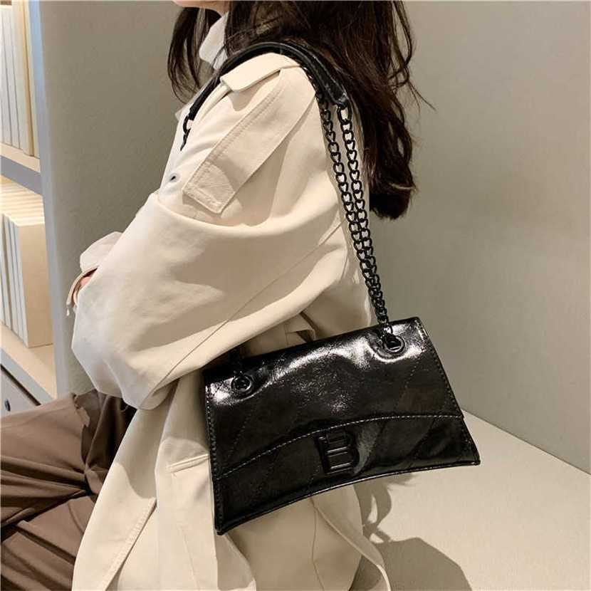 

Designer bag 2023 handbag Netizen Same Letter Hourglass New Texture Trend Shoulder Versatile Chain Crossbody Women's, Black13