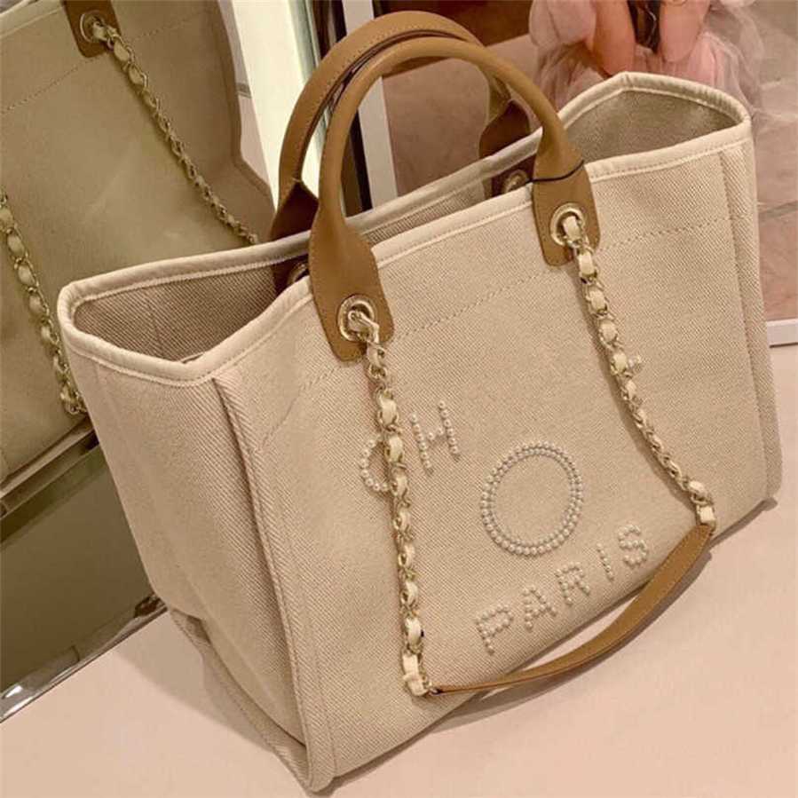 

Luxury Women's Hand Canvas Beach Bag Tote Handbags Classic Large Backpacks Capacity Small Chain Packs Big Crossbody D6IA factory outlet 55% off sale, Beige