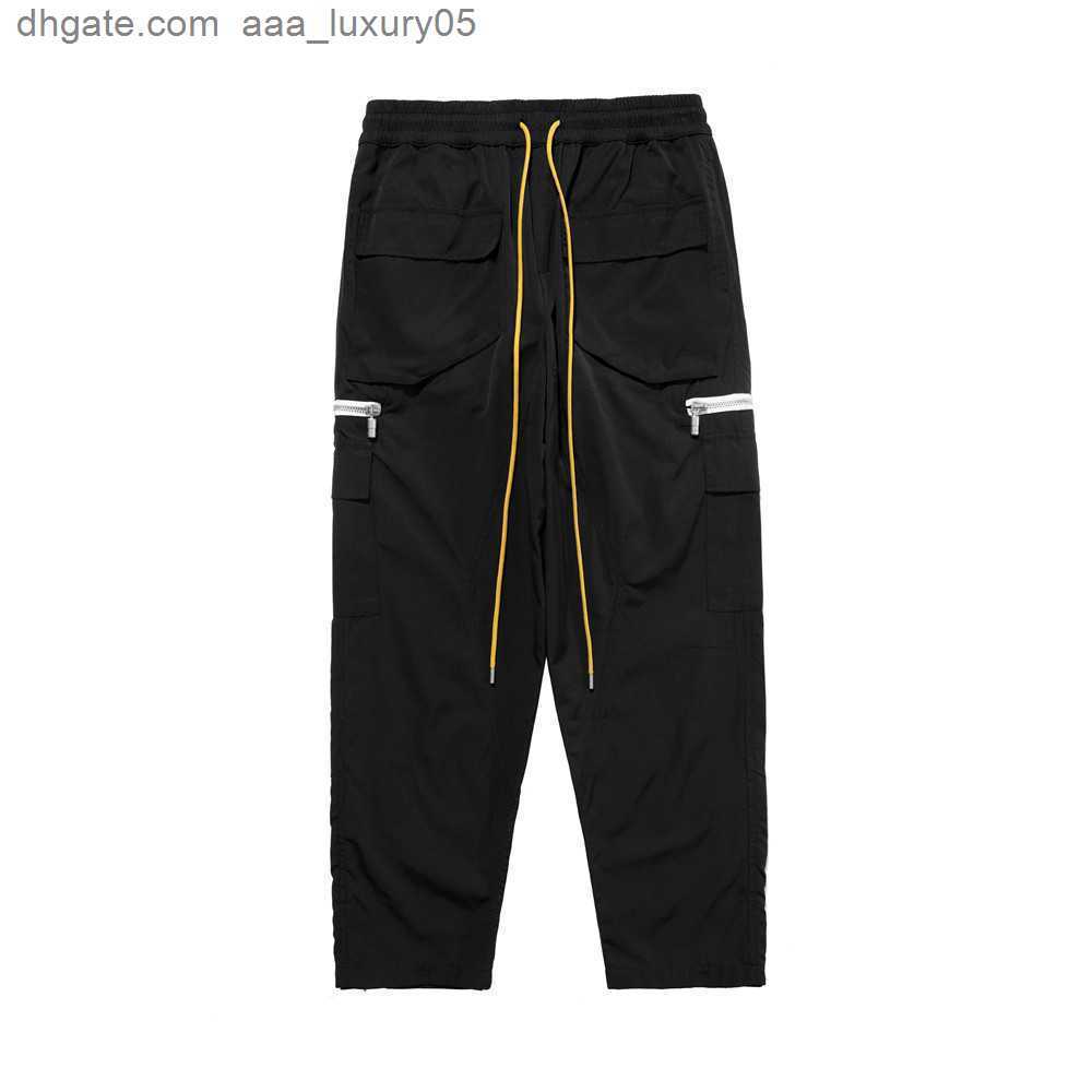 

Designer Clothing Casual Pant 2023 New Trendy Hip Hop Button High Street Multi Pocket Zipper Drawstring Rhude Pants Streetwear Jogger Trousers Sweatpants, Black