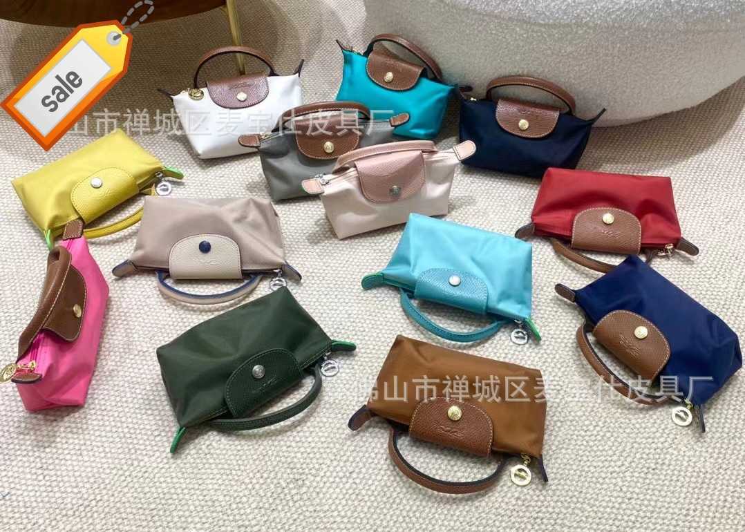 

Women's Designer Bags High Version Longxiang Bun Mini Handheld Dumpling Change Mobile Bag Single Handle Factory Direct Sales, Camellia decor