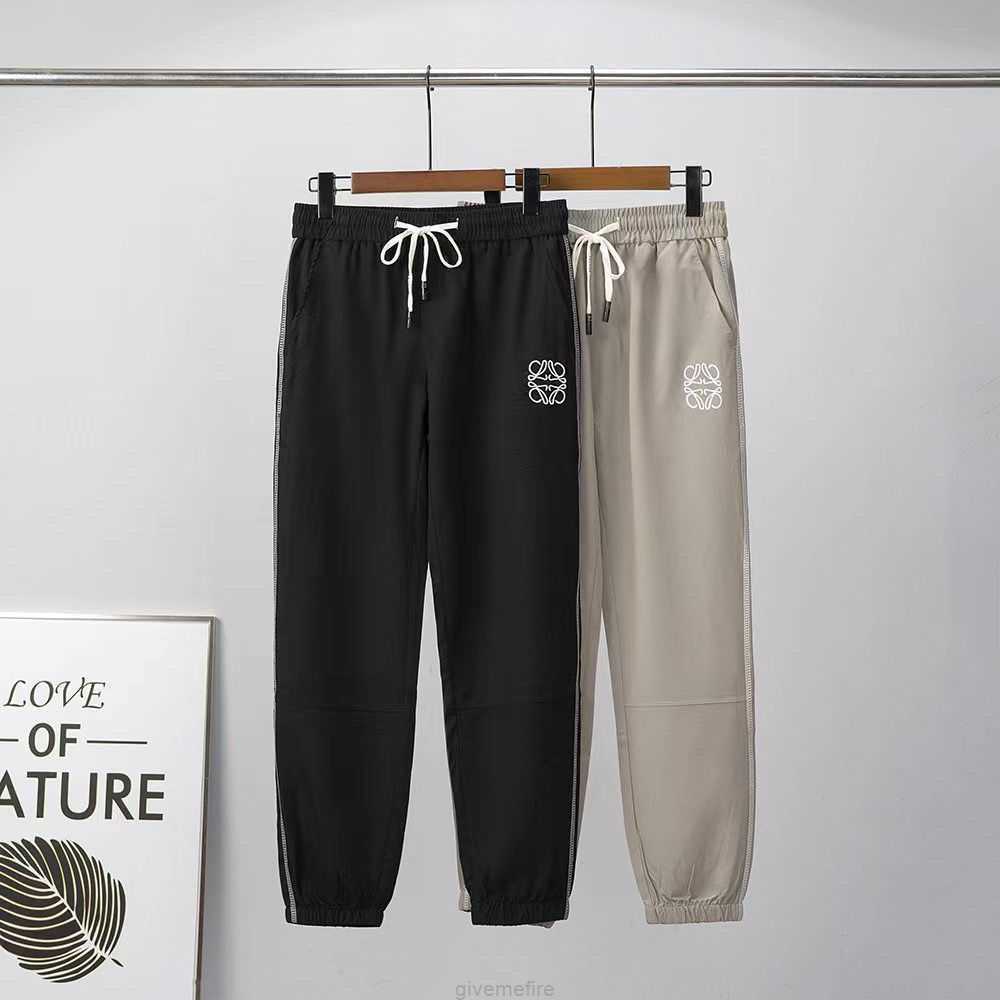 

Designer Fashion Clothing Casual Pant 2023 Loewe Embroidered Couples Guard Pants Mens and Womens Sports Tianchan Ice Silk Leisure Trend Streetwear Jogger Trousers, Black