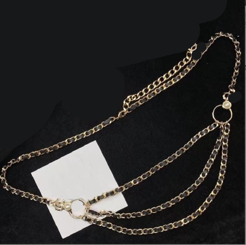 

Pendant Necklaces European and American high-quality popular jewelry twist chain black sheepskin belt with half piece pearl multi-layer waist chain