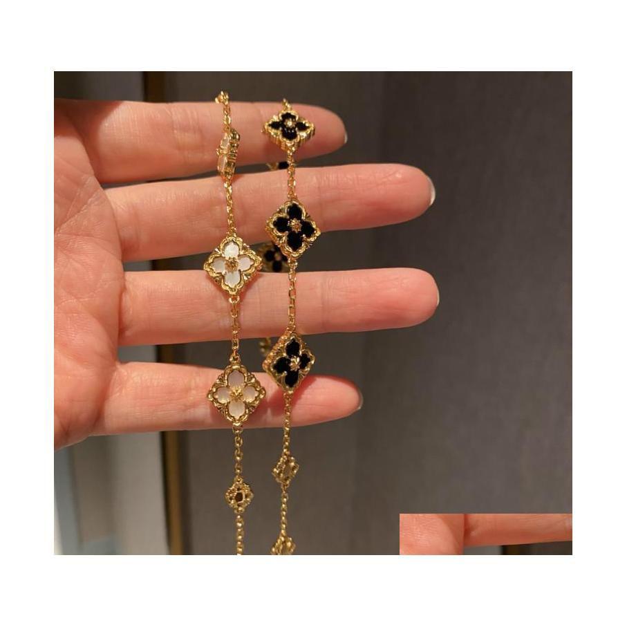 

Charm Bracelets Designer Vintage Solid Color Lucky Four Leaf Clover For Women Stainless Steel Jewelry Bracelet Gift D Dha29