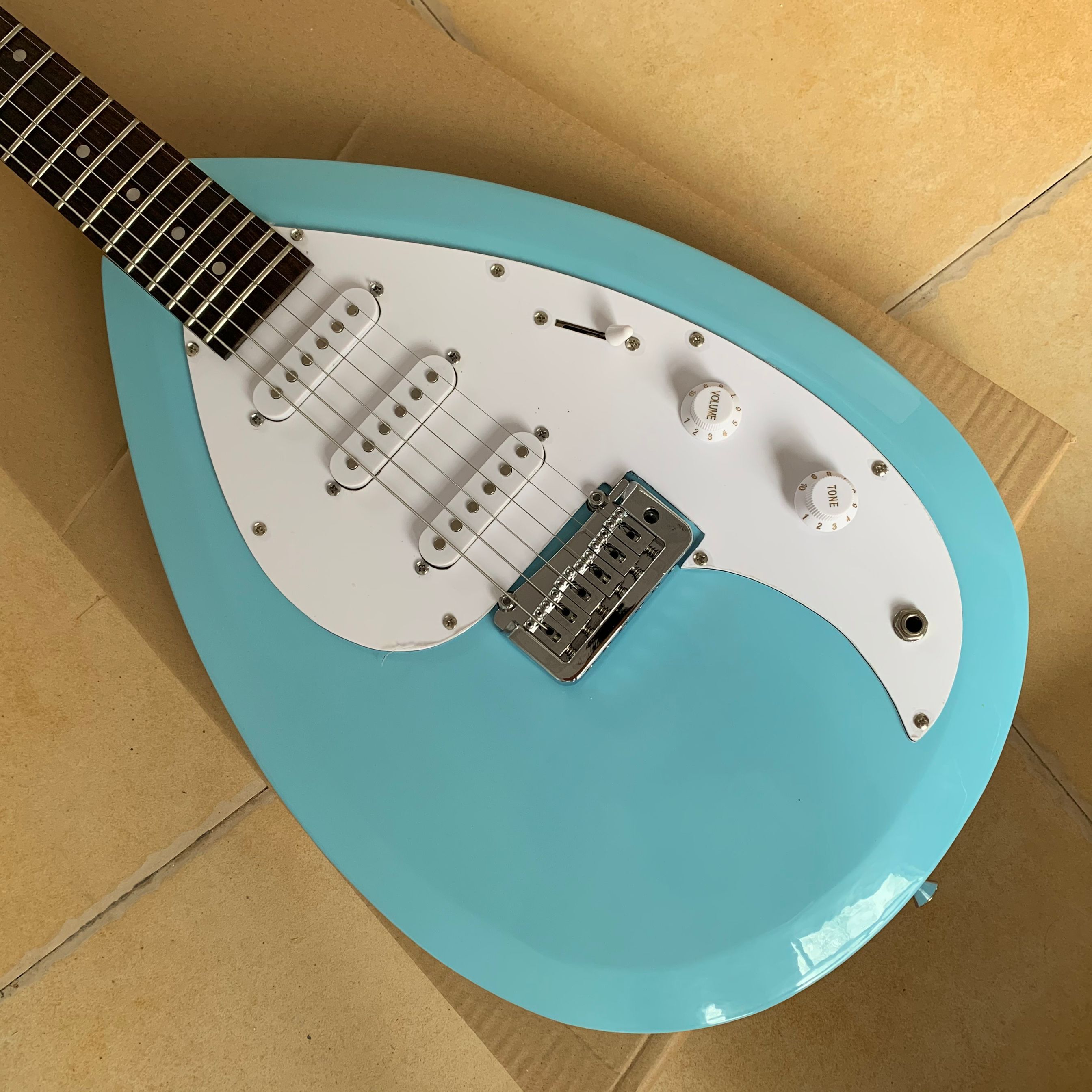 

Custom Phantom Hutchins Brian Jones Vox Tear drop Signature Light Blue Electric Guitar Single Coil Pickups White Pickguard Tremolo Bridge Vintage Tuners