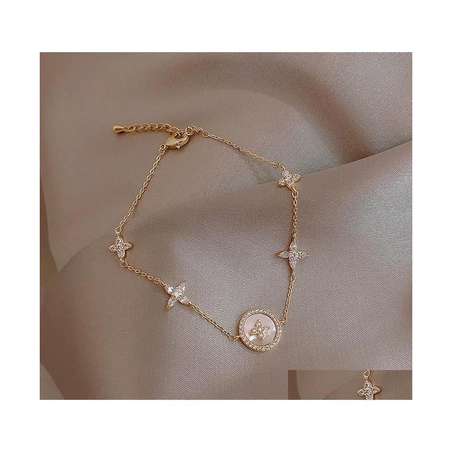 

Other Bracelets Bracelet Womens With Zircon Inlaid Plum Blossom Cross Light Luxury Highgrade Feeling Ring Net Red Dro Dhfjt