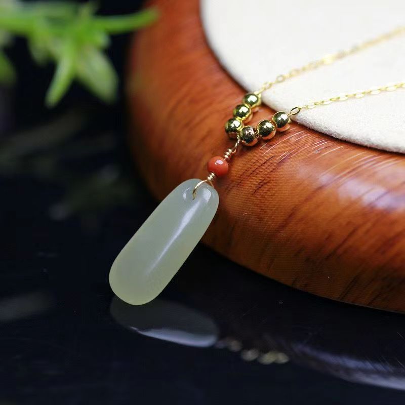 

Natural Hotan Jade Water Drop Pendant with South Red Round Bead Design as a Birthday Gift for Girlfriend