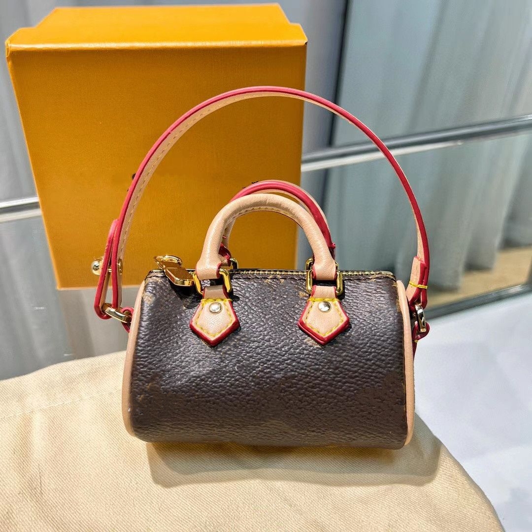 

Designer Letter Unisex Key Wallets Luxury Brand Brown Mini Boston Bag Coin Purses Famous Brand Plaid Women and Men Zipper Clutch Bag Totes Crossbody Pendant Charms, Brown letter