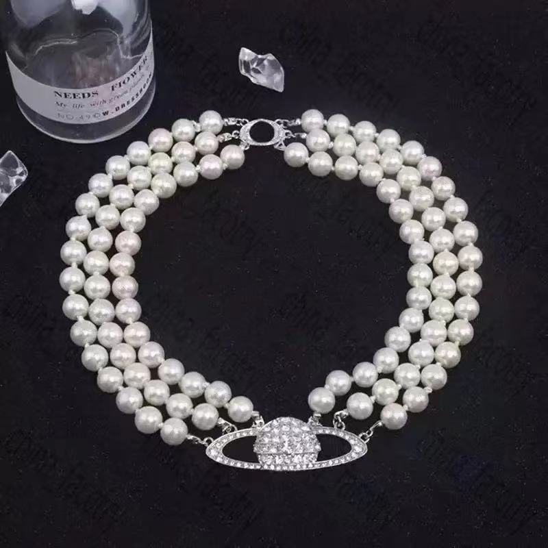 

Luxury Fashionable Pearl necklace Advanced retro Three layer pearl Shiny Saturn bead pendant 222